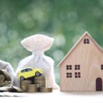 Công chứng hợp đồng thế chấp tài sản khi người thế chấp ở nước ngoài Model,House,With,Money,Bag,And,Miniature,Car,Model,On